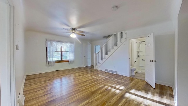 interior space featuring ceiling fan and hardwood / wood-style flooring