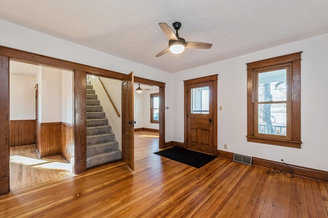 entrance foyer featuring ceiling fan and hardwood / wood-style floors