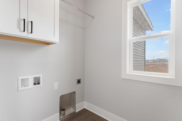 washroom with washer hookup, dark wood finished floors, cabinet space, electric dryer hookup, and baseboards