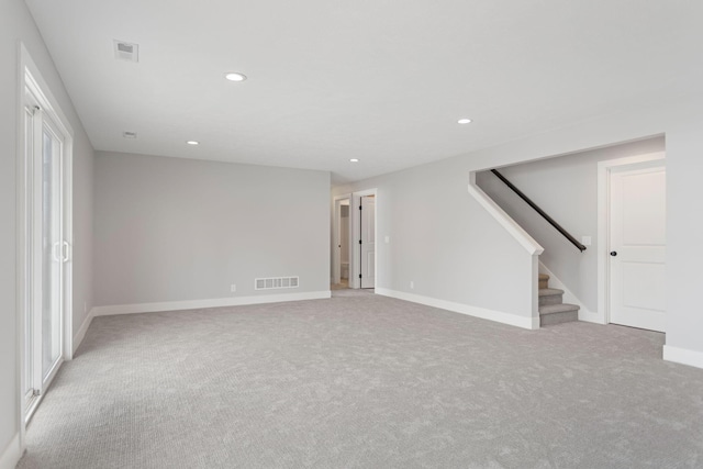 spare room featuring stairs, baseboards, visible vents, and recessed lighting