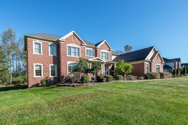 view of front of property with a front lawn