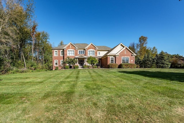 view of front of home with a front lawn