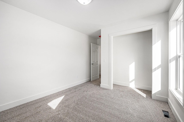 unfurnished bedroom featuring carpet flooring