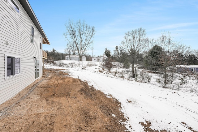 view of snowy yard