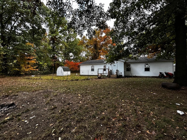 exterior space featuring a shed