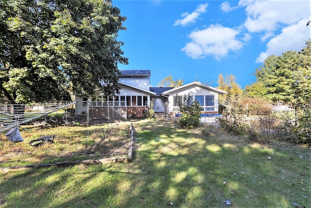 view of front of property with a front lawn