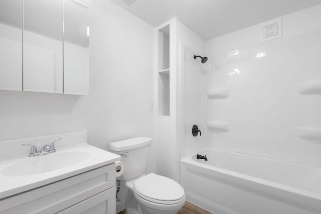 full bathroom featuring wood-type flooring, vanity, bathing tub / shower combination, and toilet