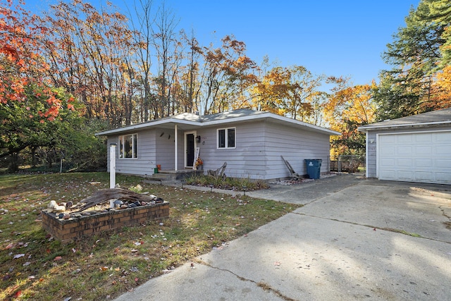 ranch-style house featuring a garage