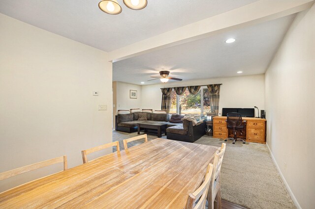 dining room with carpet floors and ceiling fan