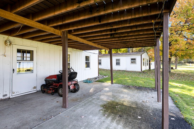 view of patio / terrace featuring a storage shed