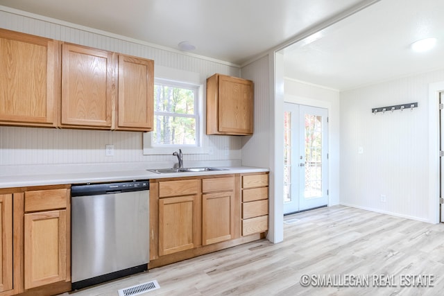 kitchen featuring sink, dishwasher, crown molding, light hardwood / wood-style flooring, and light brown cabinets