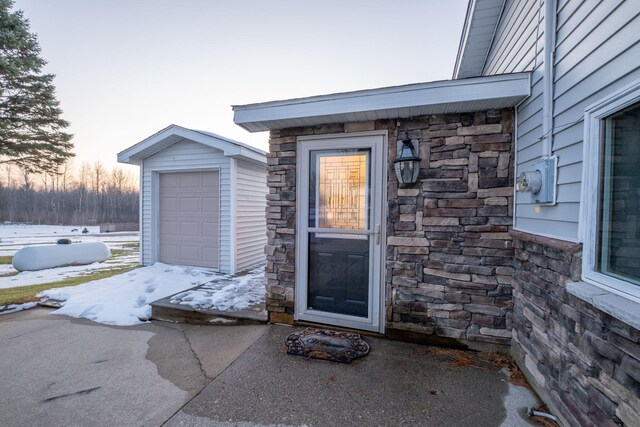 view of snow covered property entrance