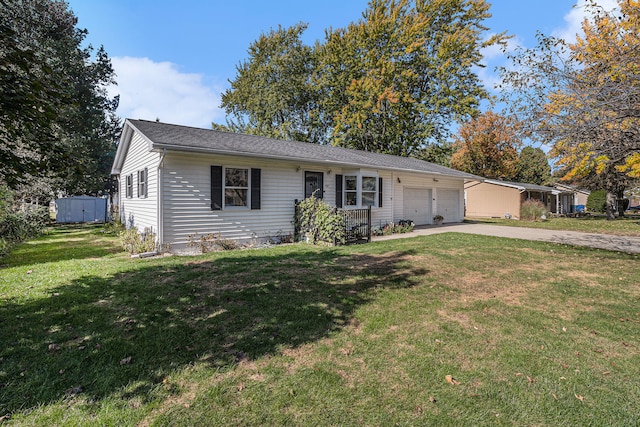 ranch-style home with a front lawn and a garage