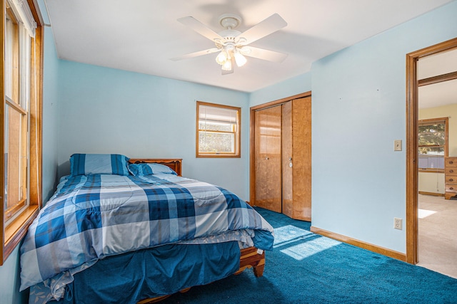 bedroom featuring carpet, a closet, and ceiling fan