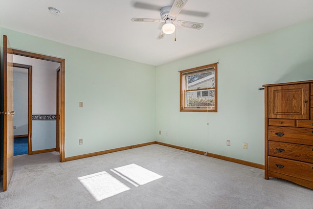 unfurnished bedroom with light carpet and ceiling fan