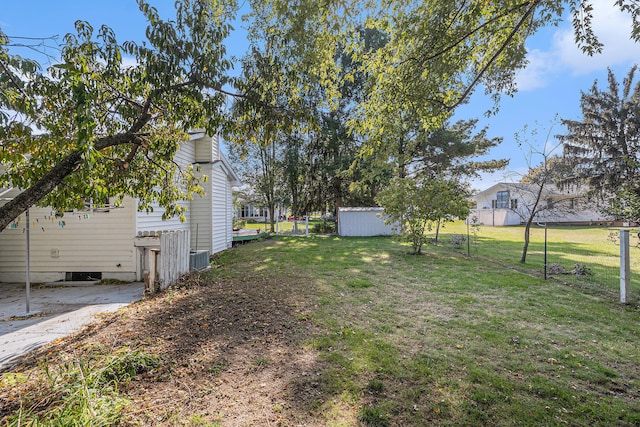 view of yard with a storage shed