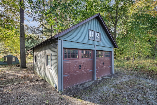 view of outbuilding featuring a garage