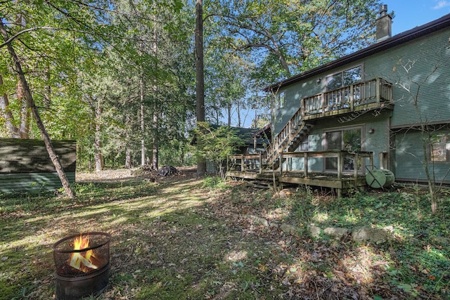 view of yard with a wooden deck