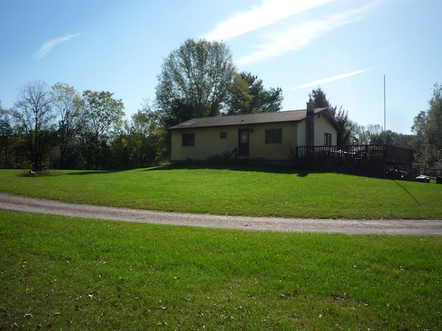 view of front of home featuring a front yard