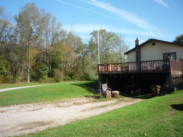 view of yard featuring a deck