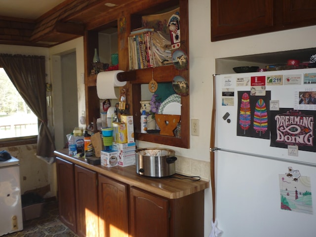 kitchen featuring white refrigerator