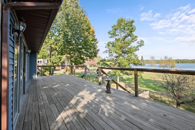 wooden terrace with a water view