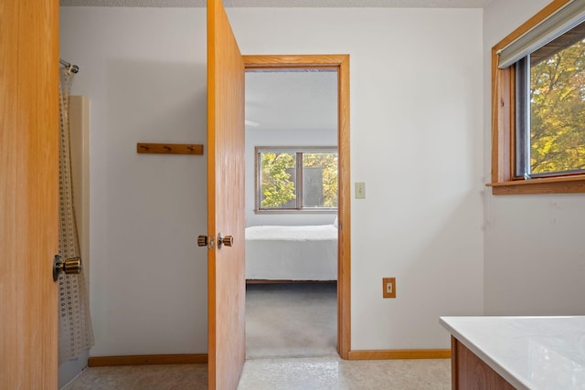 bathroom with a textured ceiling