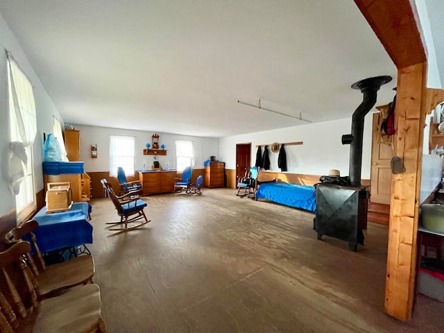 bedroom featuring a wood stove