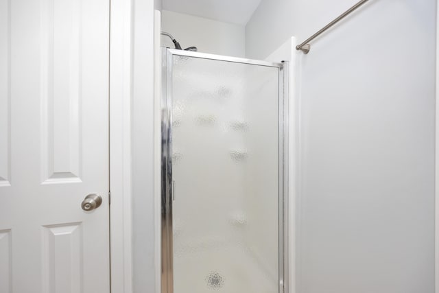 bathroom with an enclosed shower