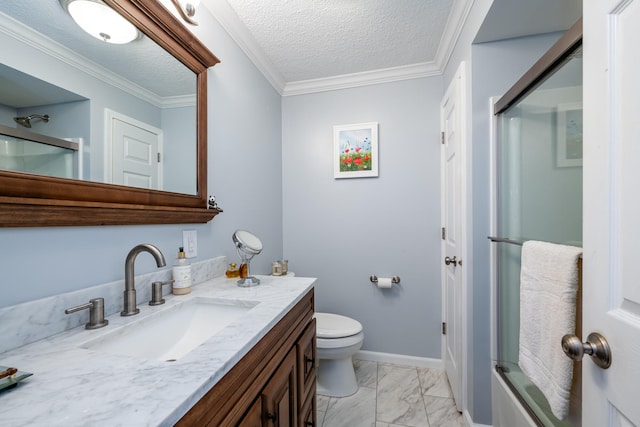 full bathroom featuring vanity, toilet, ornamental molding, and a textured ceiling