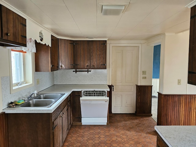 kitchen with dark brown cabinets and sink