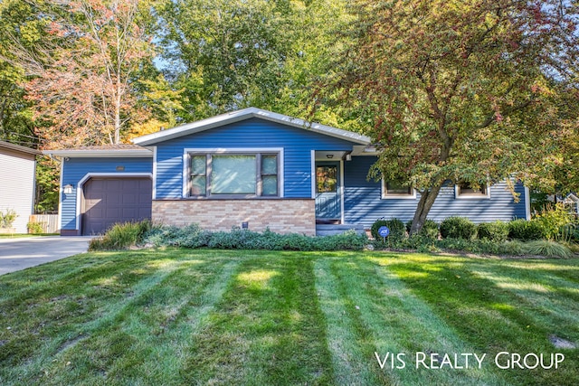 ranch-style home with a garage, driveway, brick siding, and a front yard