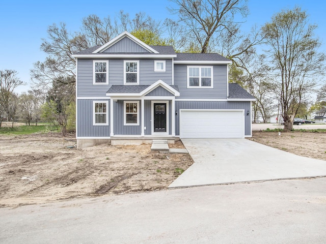 view of front of property featuring a garage