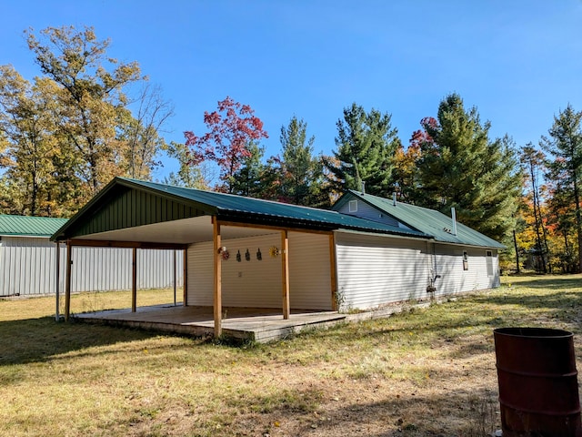 view of side of home featuring a lawn