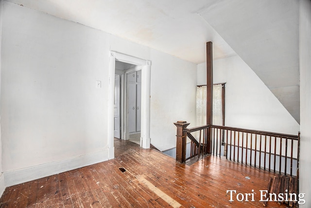 unfurnished room featuring wood-type flooring