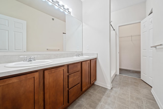 bathroom with vanity and walk in shower