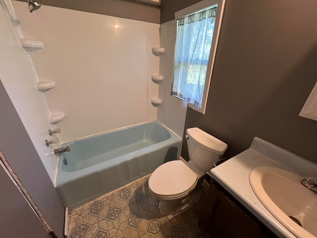 full bathroom featuring bathtub / shower combination, vanity, toilet, and tile patterned floors