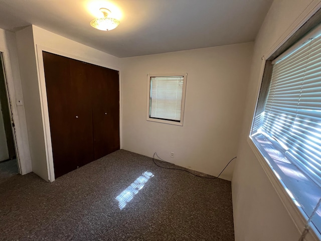 unfurnished bedroom featuring a closet