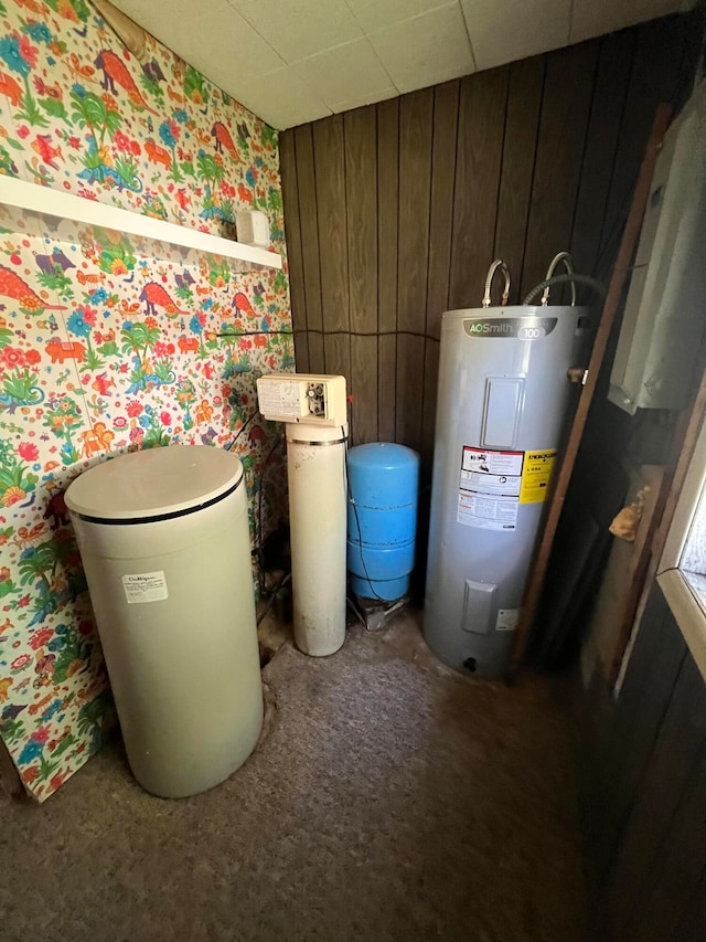 utility room featuring electric water heater