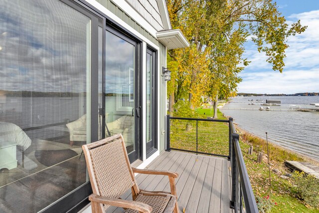 balcony featuring a water view