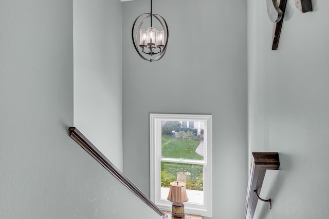 interior details featuring a chandelier