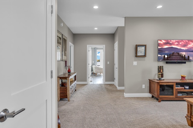 foyer with light carpet