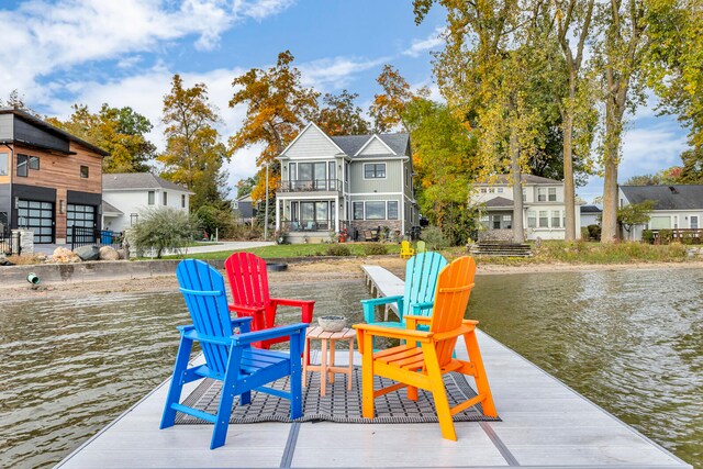 dock area with a water view