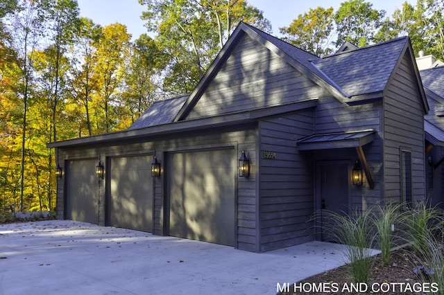 view of home's exterior with a garage