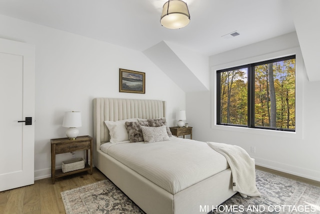 bedroom with light wood-type flooring