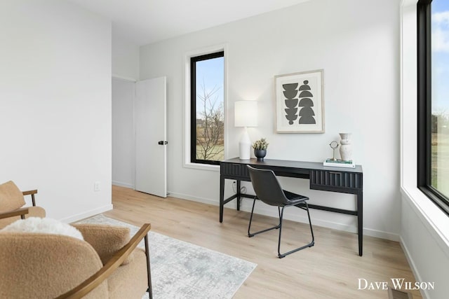 home office featuring light wood-type flooring