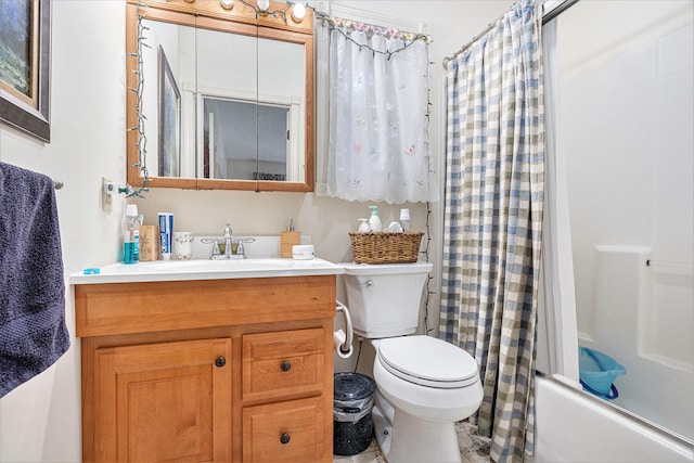 full bathroom featuring vanity, shower / bath combination with curtain, and toilet