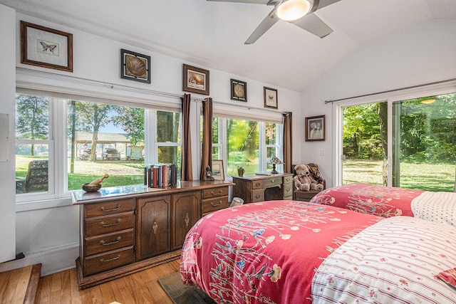 bedroom featuring vaulted ceiling, light hardwood / wood-style floors, and ceiling fan