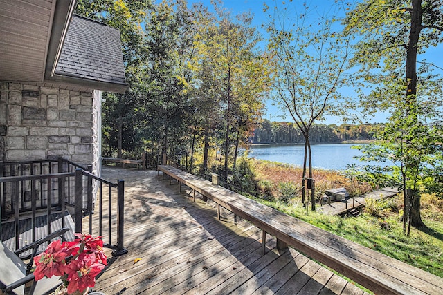 deck featuring a water view