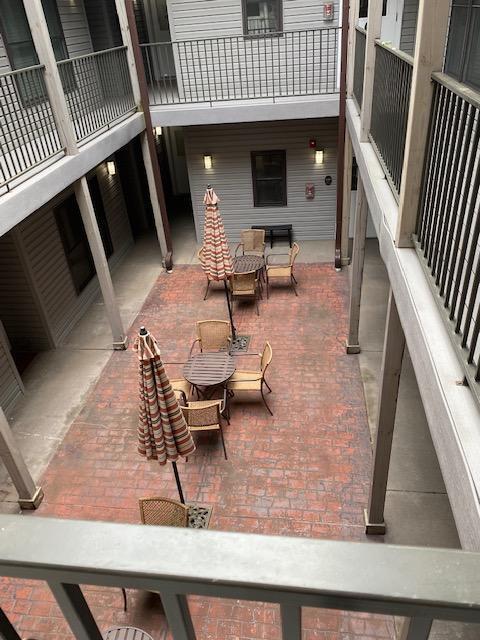 view of patio / terrace with a balcony